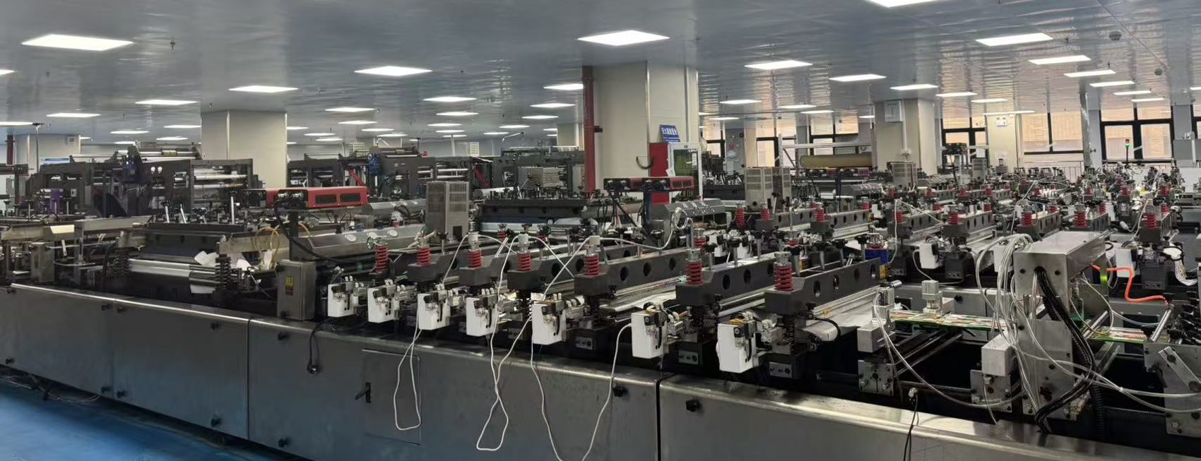 Bag-making lines in our own factory — pouches are made in every size on these machines